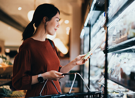 Woman grocery shopping in Waterlin